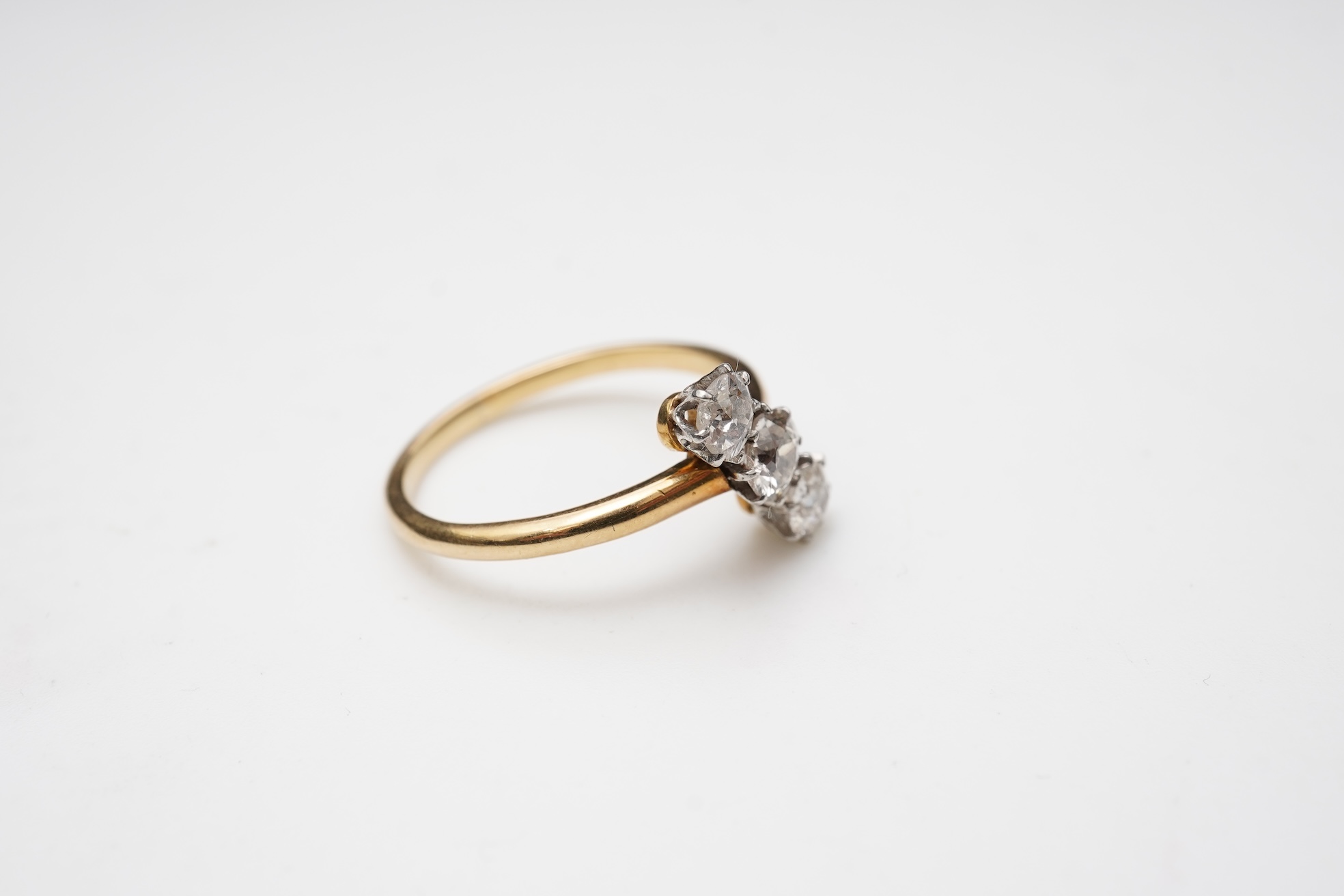 A diamond three-stone ring, early 20th century